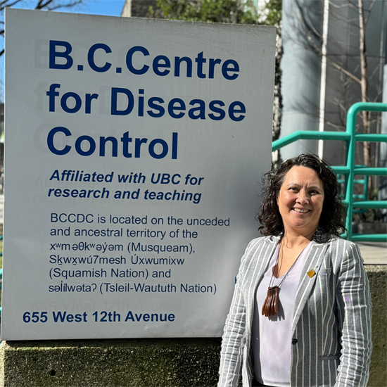 Dr. Linda Hoang stands in front of the BCCDC office